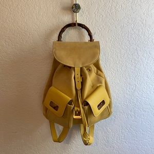 Gucci bamboo handle yellow leather backpack